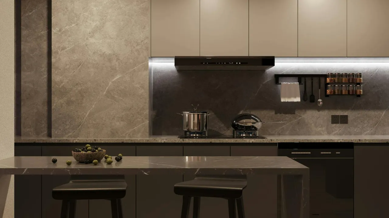 Nowoczesna kuchnia z wyspą, gdzie dyskretne oświetlenie led pod szafki kuchenne podkreśla marmurowe blaty i eleganckie dodatki.