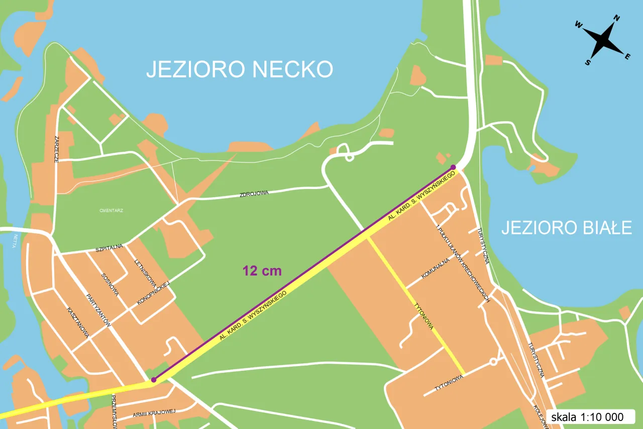 Mapa z jeziorami i ulicami. Pokazuje, jak wytłumaczyć dziecku skalę na przykładzie 12 cm na mapie. Skala 1:10 000.