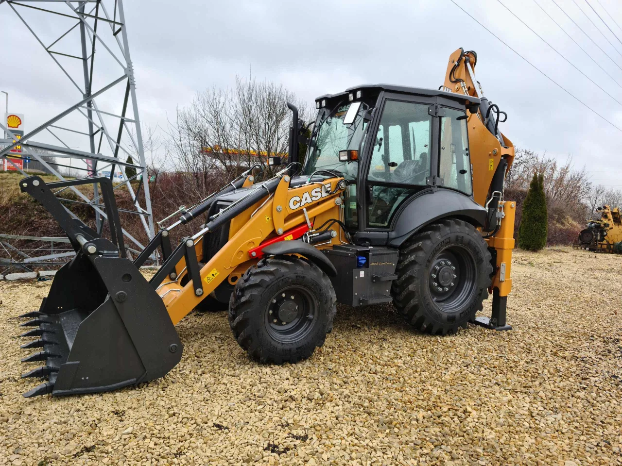 Używana koparko-ładowarka na sprzedaż
