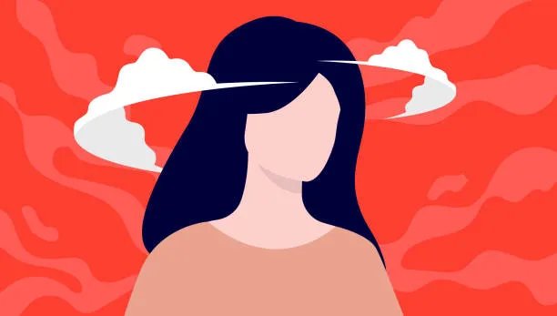 kobieta z mgłą m&oacute;zgową, zamyślona, rozmyte tło