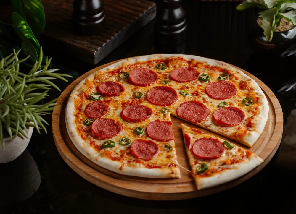 Zdjęcie Z czym pizza domowa? Sprawdź najlepsze składniki i porady