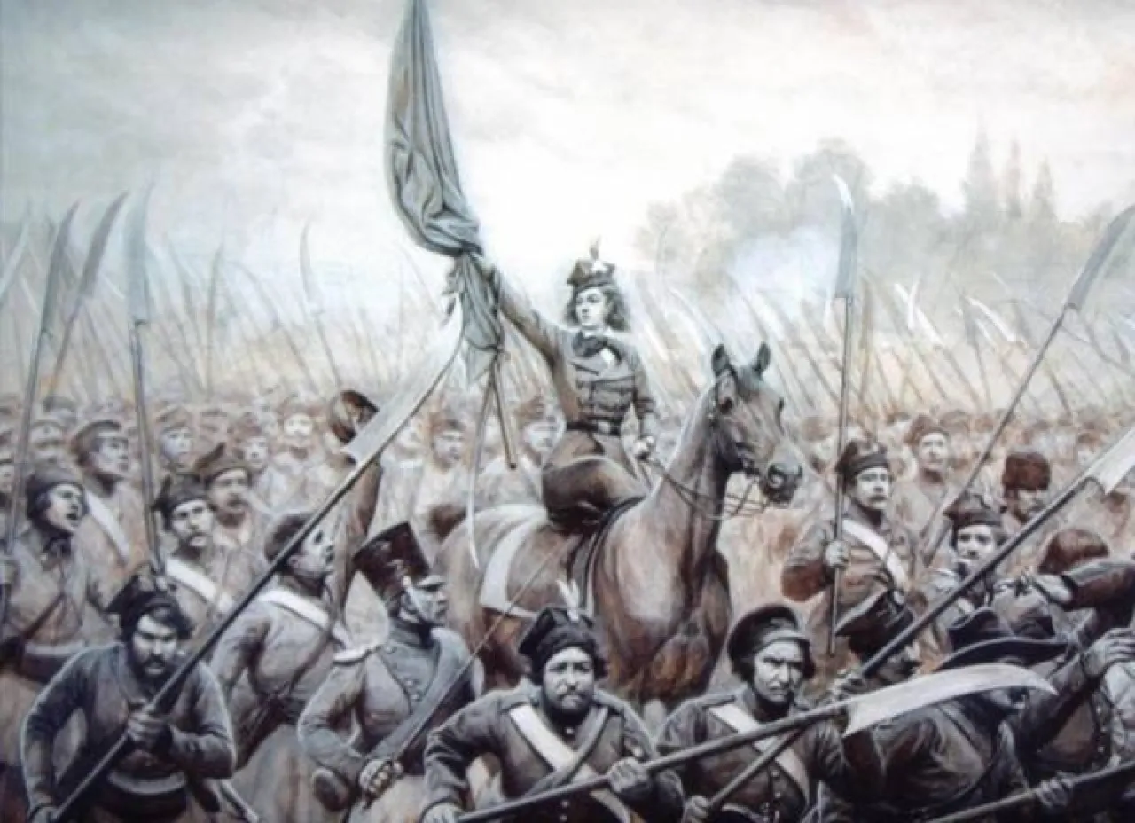 Emilia Plater na koniu, z uniesionym sztandarem, prowadzi powstańców. Obraz inspirowany jej heroizmem, jak w wierszu.