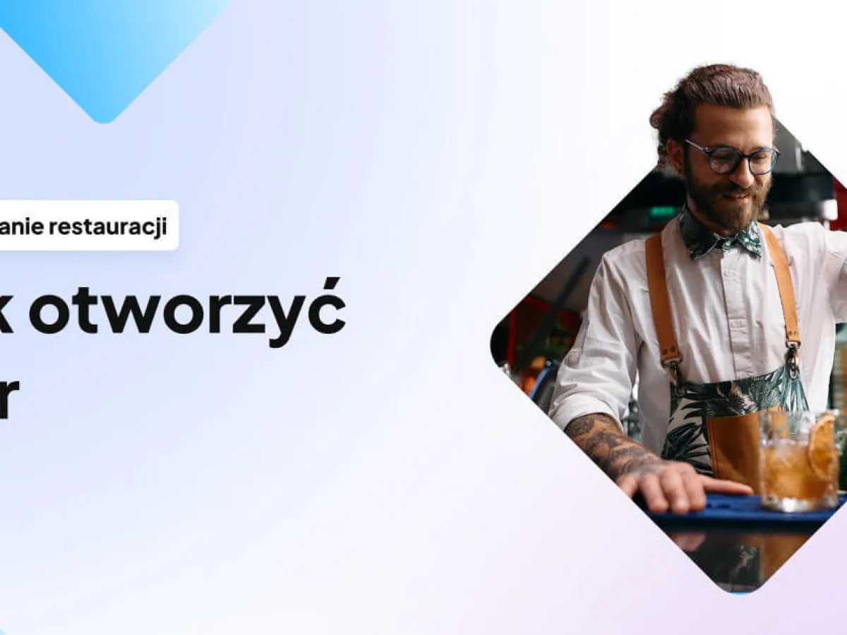 Jak założyć drink bar? Młody barman z tatuażami przygotowuje drinka.