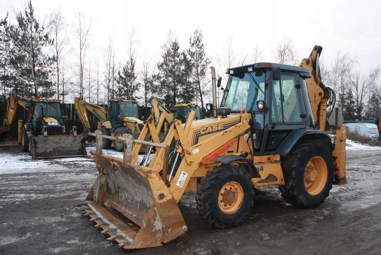 koparko-ładowarki JCB 3CX CAT 428 Case 580