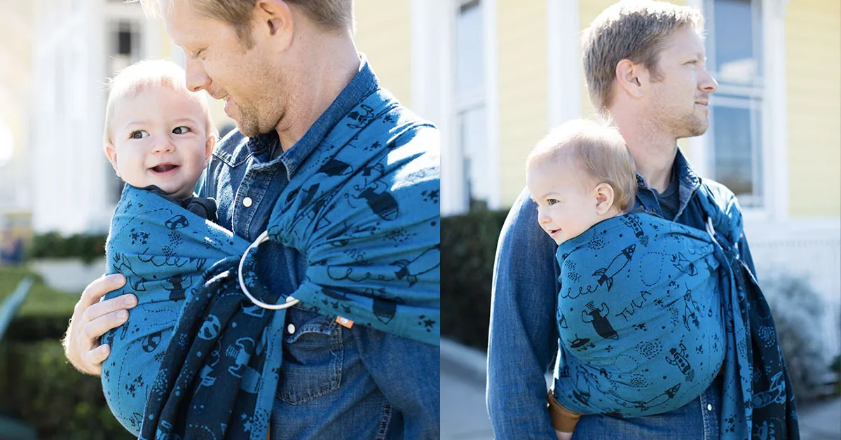 rodzic noszący niemowlę w chuście
