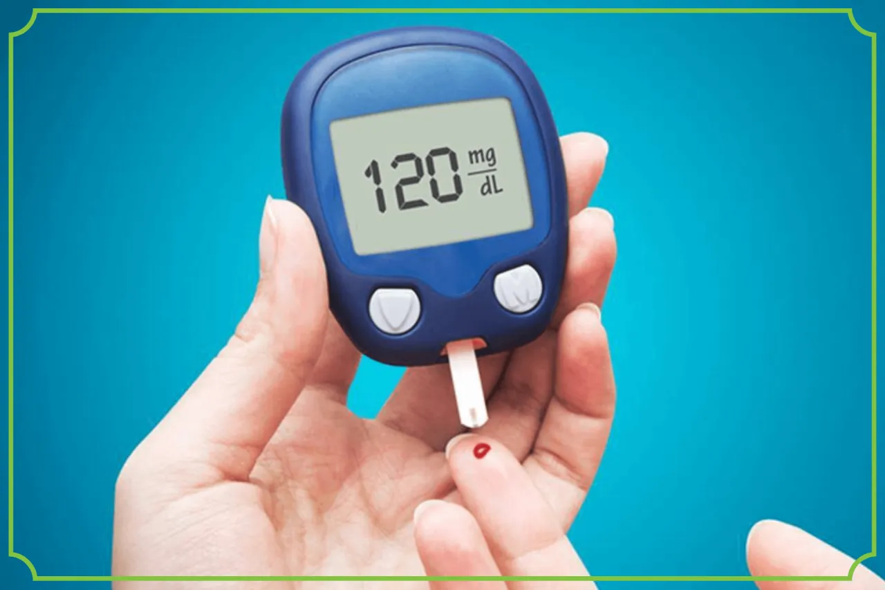 glukometr i kropla krwi na palcu