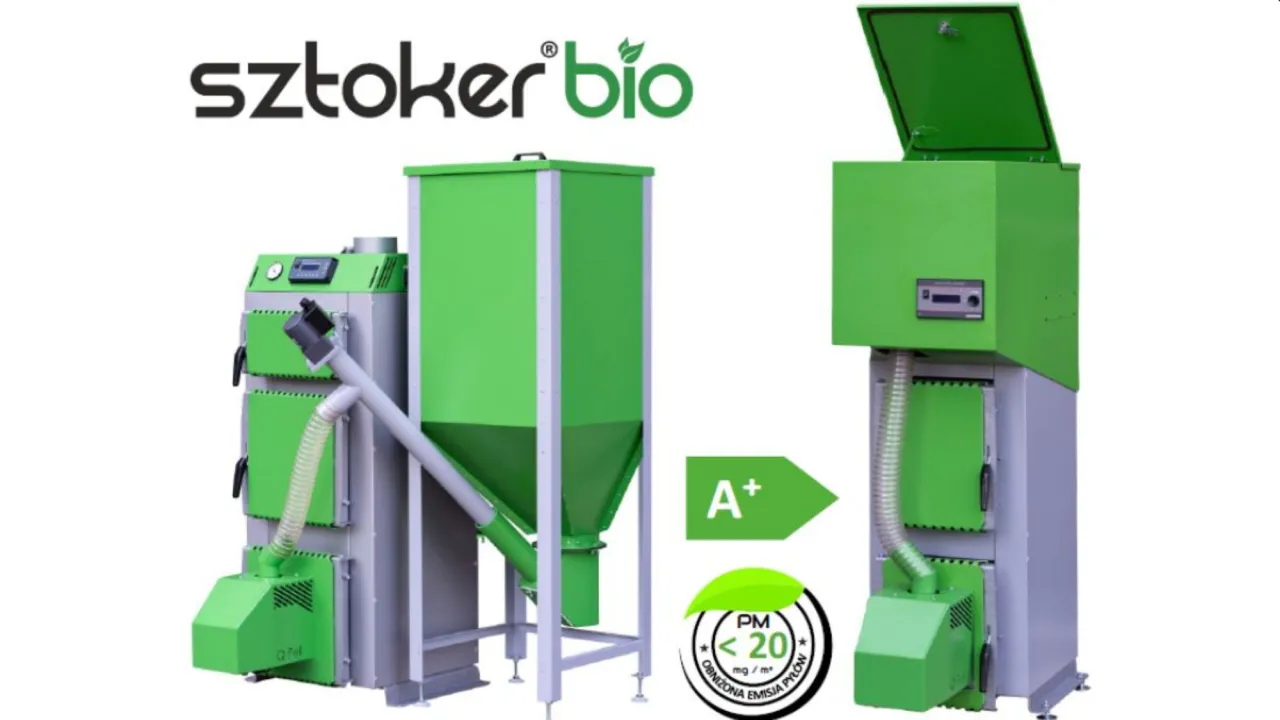 Nowoczesny mały kocioł co z podajnikiem na pellet, zielono-szary, z certyfikatem A+ i niską emisją pył&oacute;w.