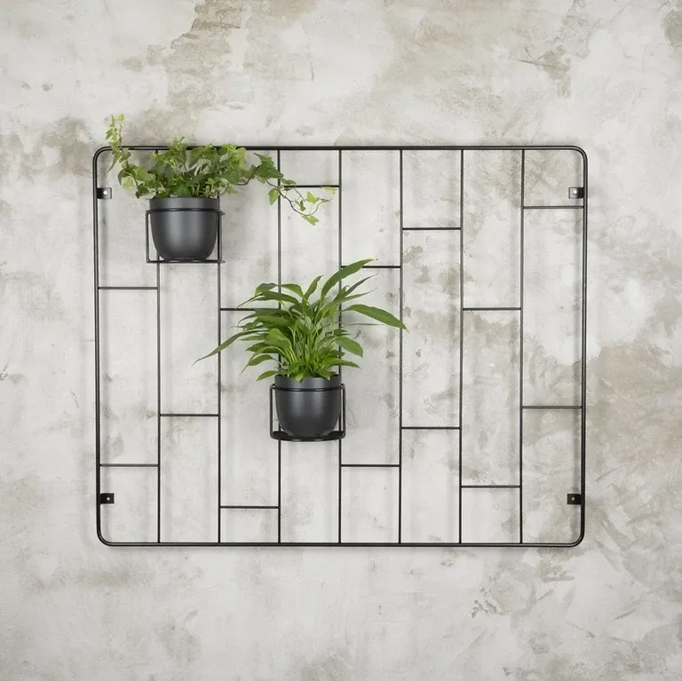 nowoczesny metalowy kwietnik ścienny