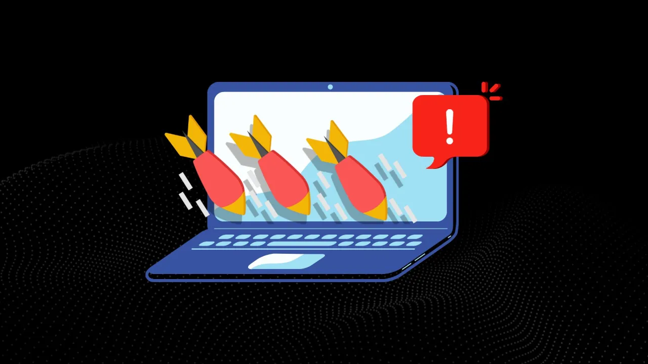 Trzy rakiety lecą w stronę ekranu laptopa, symbolizując atak brute force. Czerwona chmurka z wykrzyknikiem ostrzega przed zagrożeniem.