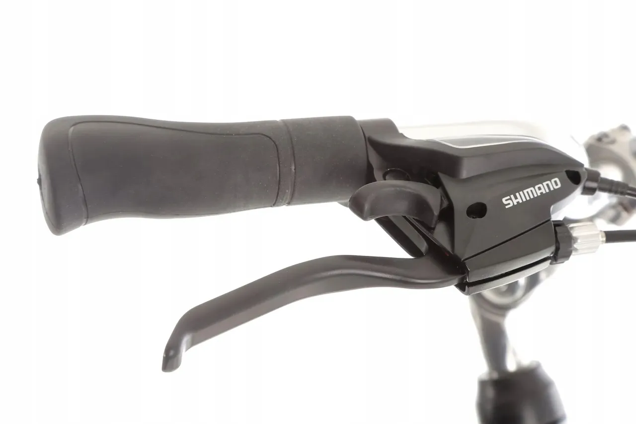 Ergonomiczny chwyt i manetka Shimano &ndash; idealna kierownica do roweru trekkingowego dla komfortowej jazdy.