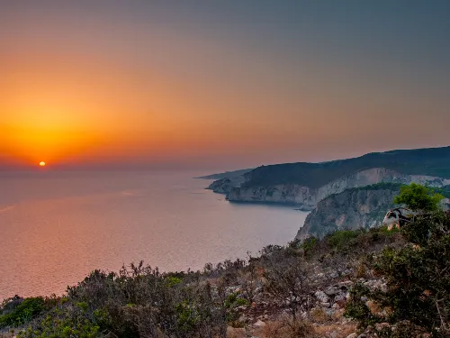 Klify Keri Mizithres zachód słońca Zakynthos