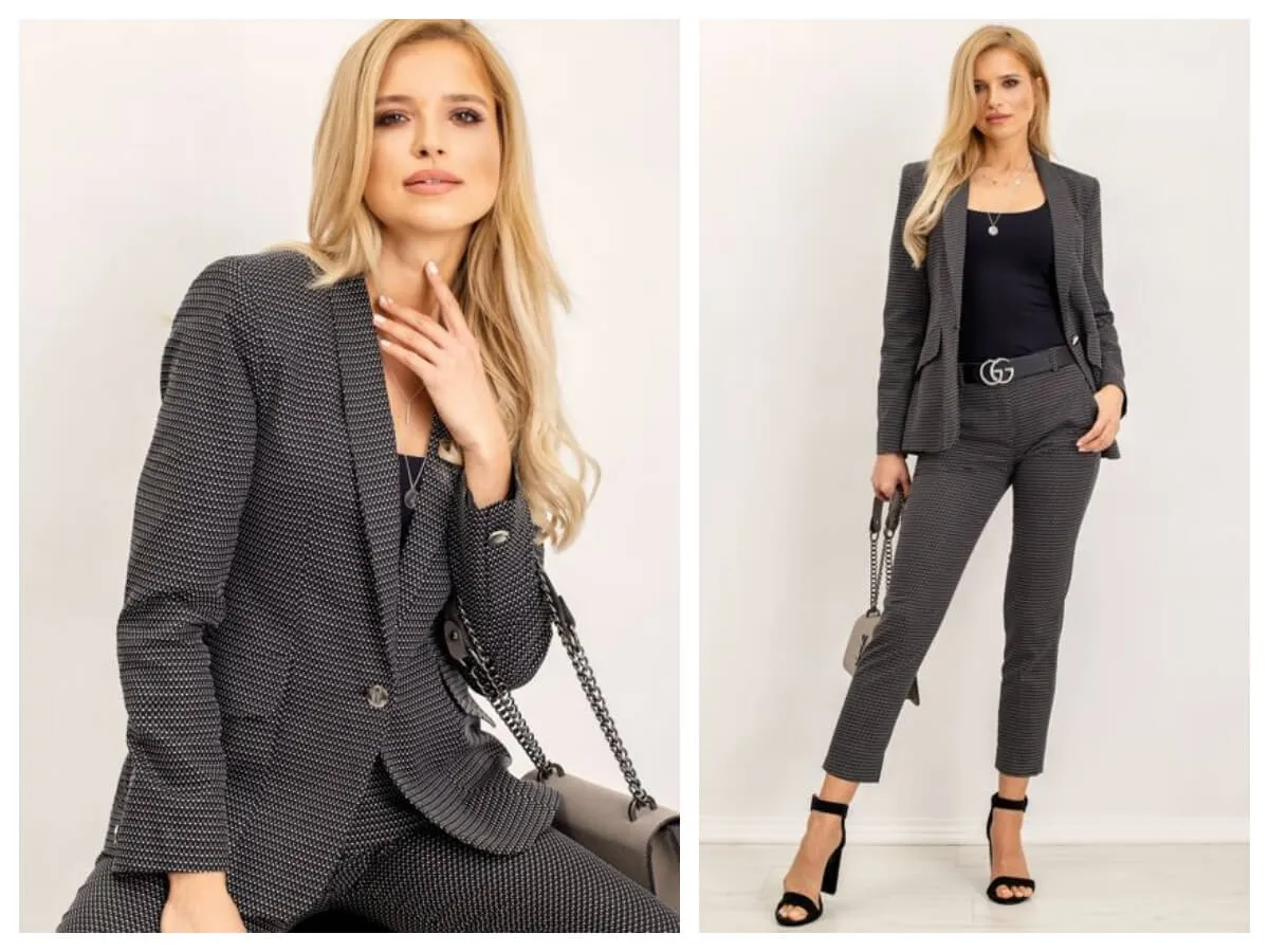 Elegancka kobieta w dopasowanym garniturze prezentuje r&oacute;żne rodzaje dress code.