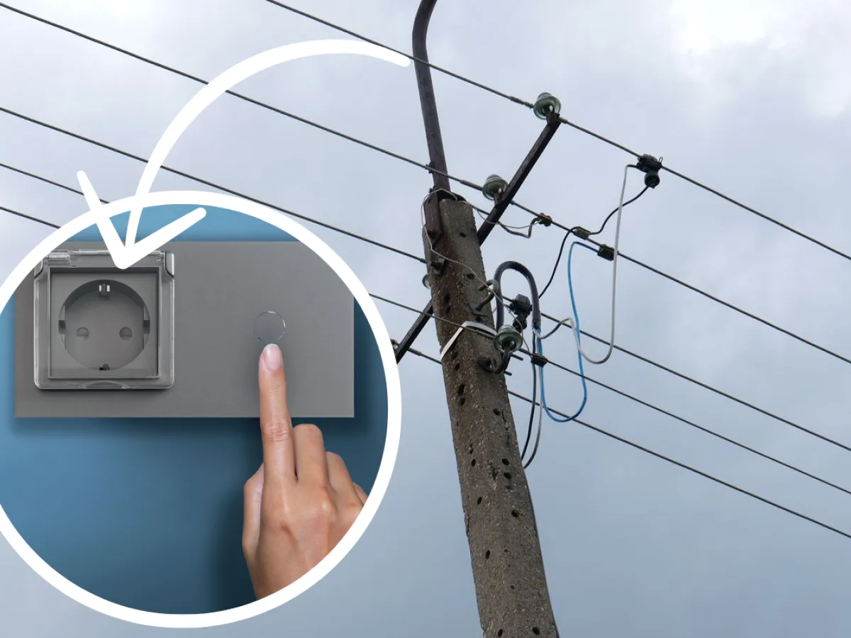 Zastanawiasz się, jakie obciążenie wytrzyma przewód 1 5? Na zdjęciu widać gniazdko i słup energetyczny.