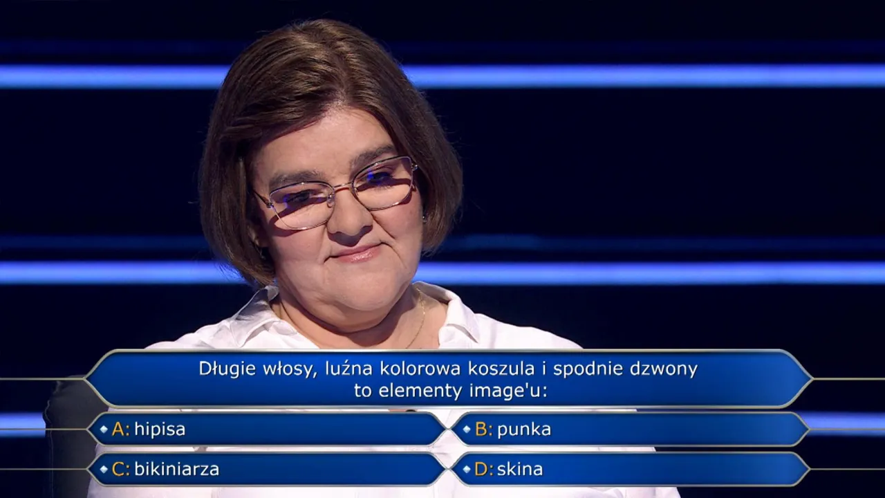 Kobieta w okularach zastanawia się, jakie było pytanie za milion w Milionerach: 