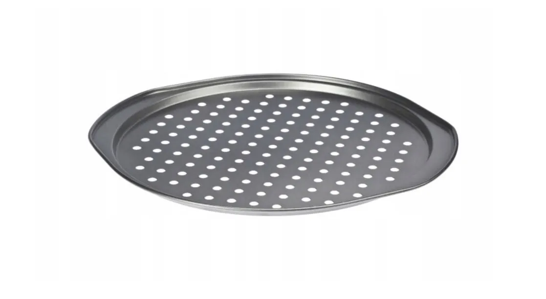Zdjęcie Blacha do pizzy z dziurkami czy bez - jaki wybór zapewni lepszy smak?