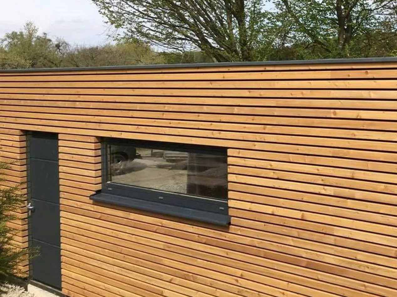 różne rodzaje elewacji drewnianych domów