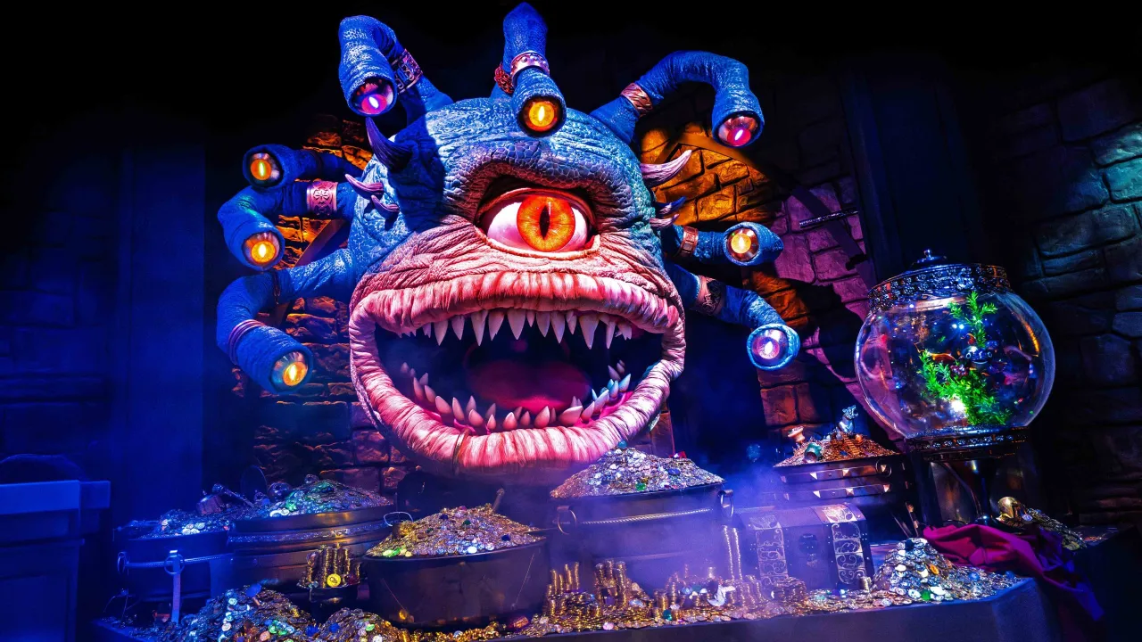 Potężny beholder po polsku, strzegący skarbów. Jego wielkie oko i liczne mniejsze oczy patrzą z grozą.