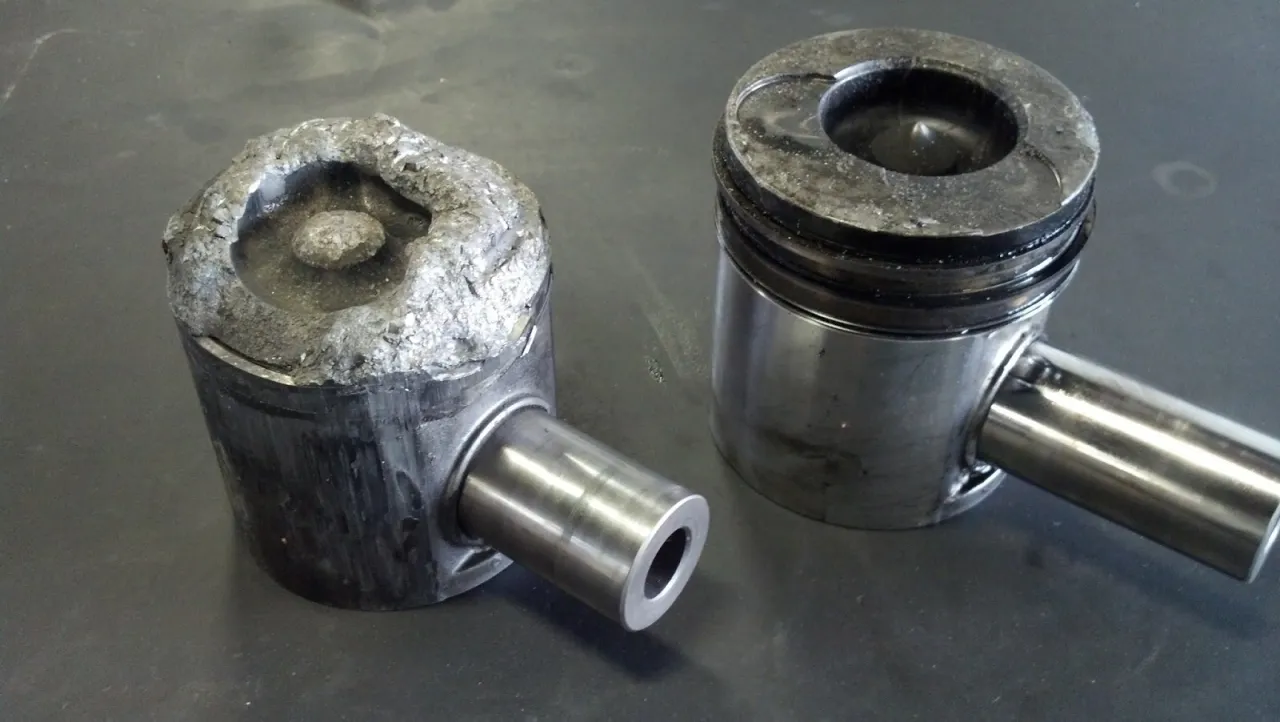 damaged diesel engine piston