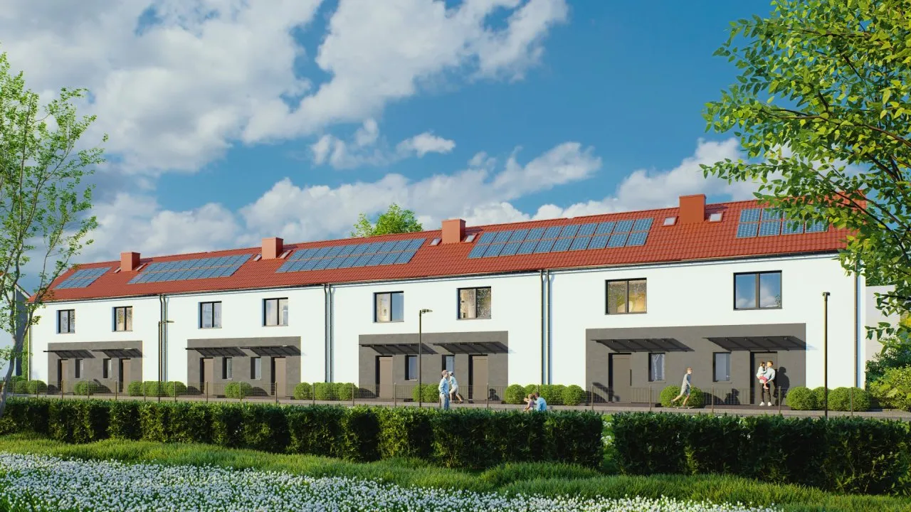 wizualizacja budynku z panelami fotowoltaicznymi