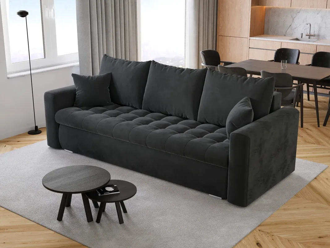 ciemnoszara kanapa w stylu skandynawskim