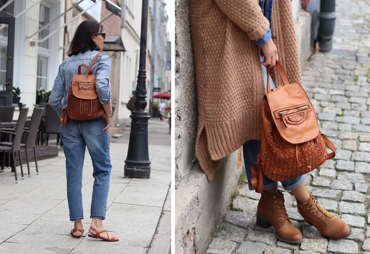 kobieta w eleganckiej stylizacji z modnym plecakiem na ulicy miasta