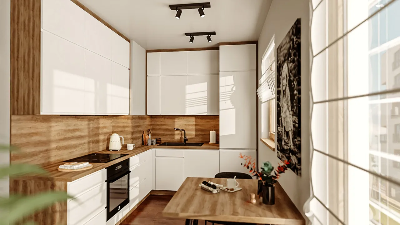 Zlew i płyta indukcyjna w małej, funkcjonalnej kuchni