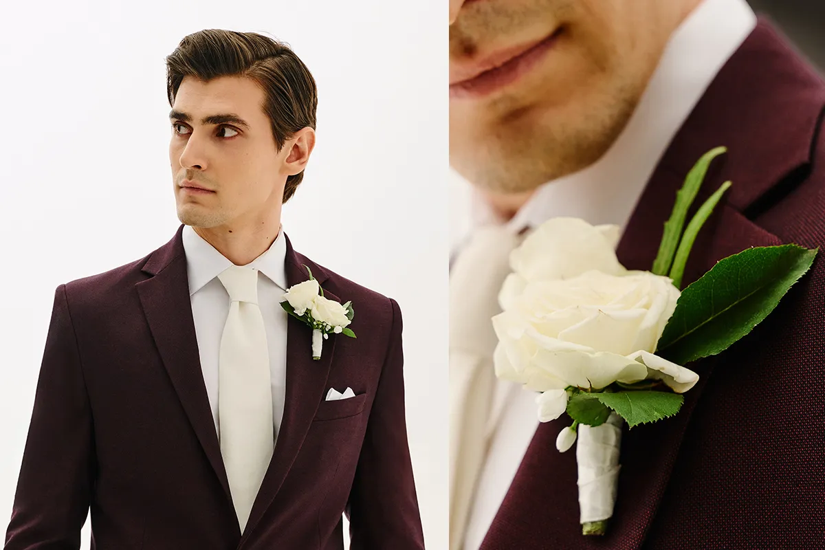 Pan młody w eleganckim garniturze ślubnym, uśmiechnięty, obok panny młodej