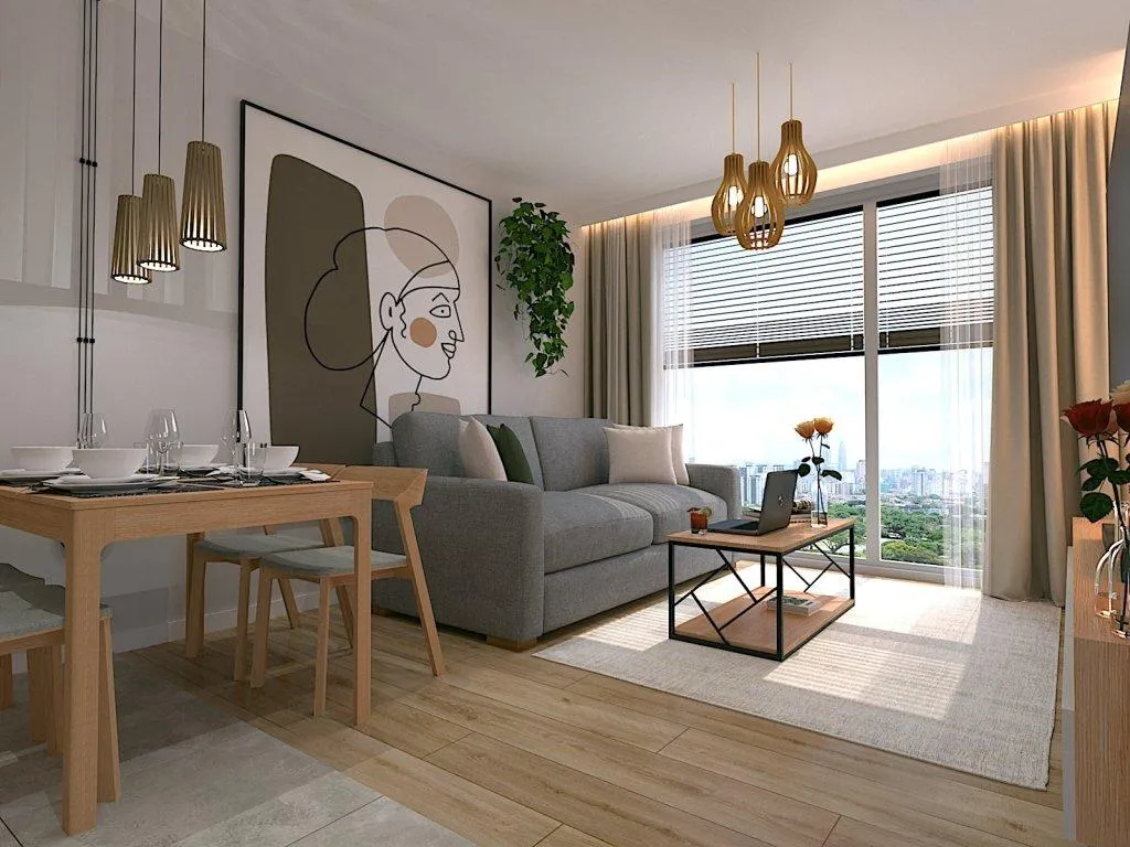 Salon z aneksem kuchennym oddzielony wyspą