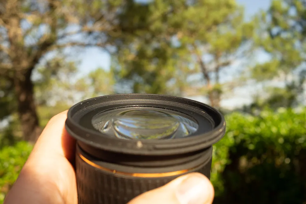 how to inspect used camera lens for damage