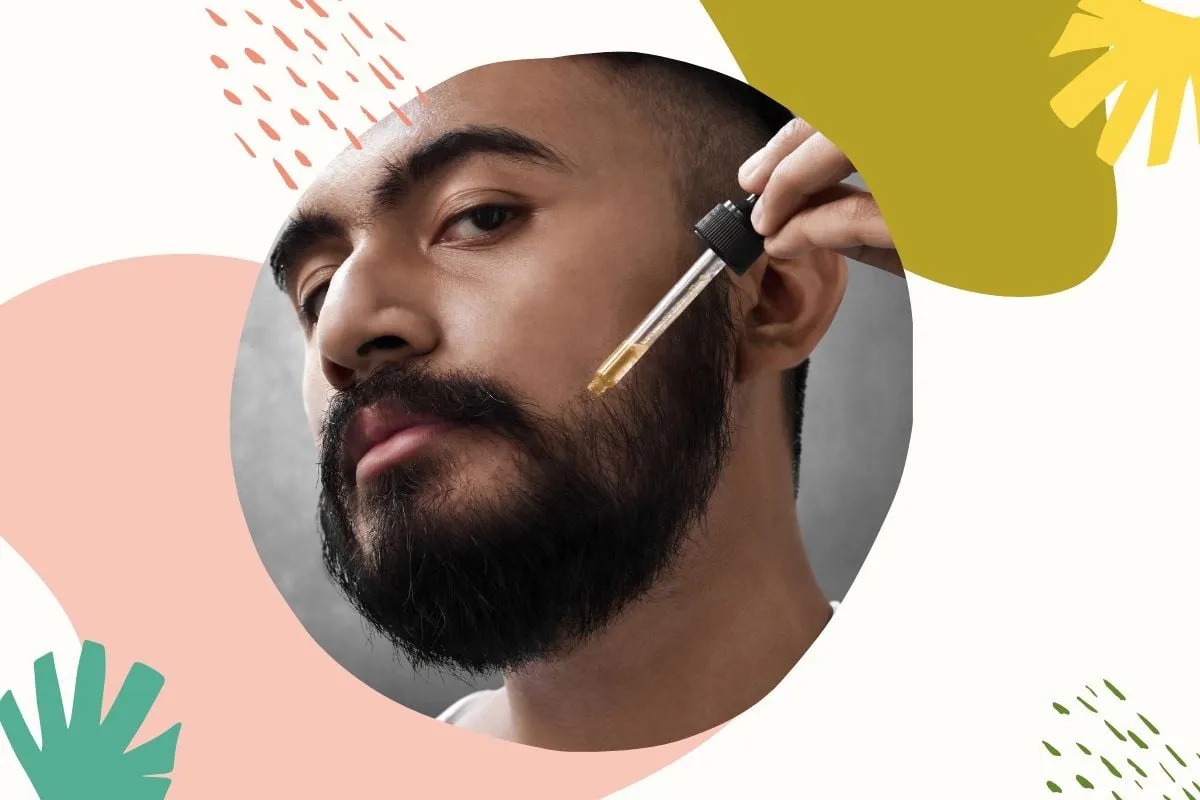 Mężczyzna aplikuje olejek na brodę. Czy częste golenie zwiększa zarost? To pytanie nurtuje wielu.