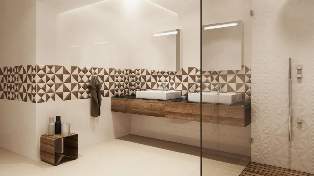 Nowoczesna łazienka z dwoma umywalkami i prysznicem. Inspiracja, jak wykafelkować małą łazienkę, z geometrycznym wzorem na ścianie.