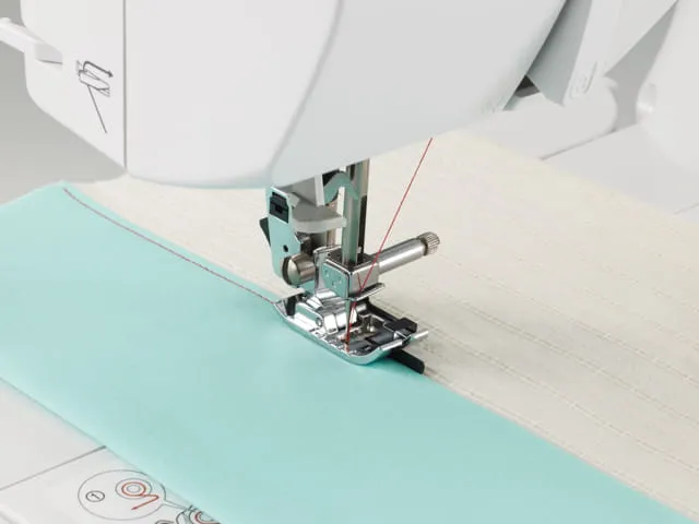 Stopka do ściegu krytego maszyny do szycia