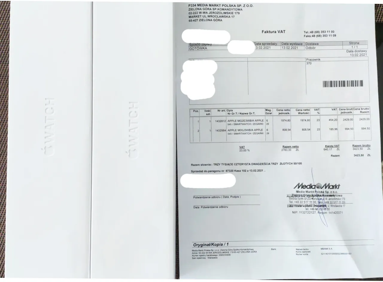Faktura VAT z Media Markt, gdzie numer faktury to 67320. Dwa opakowania Apple Watch.
