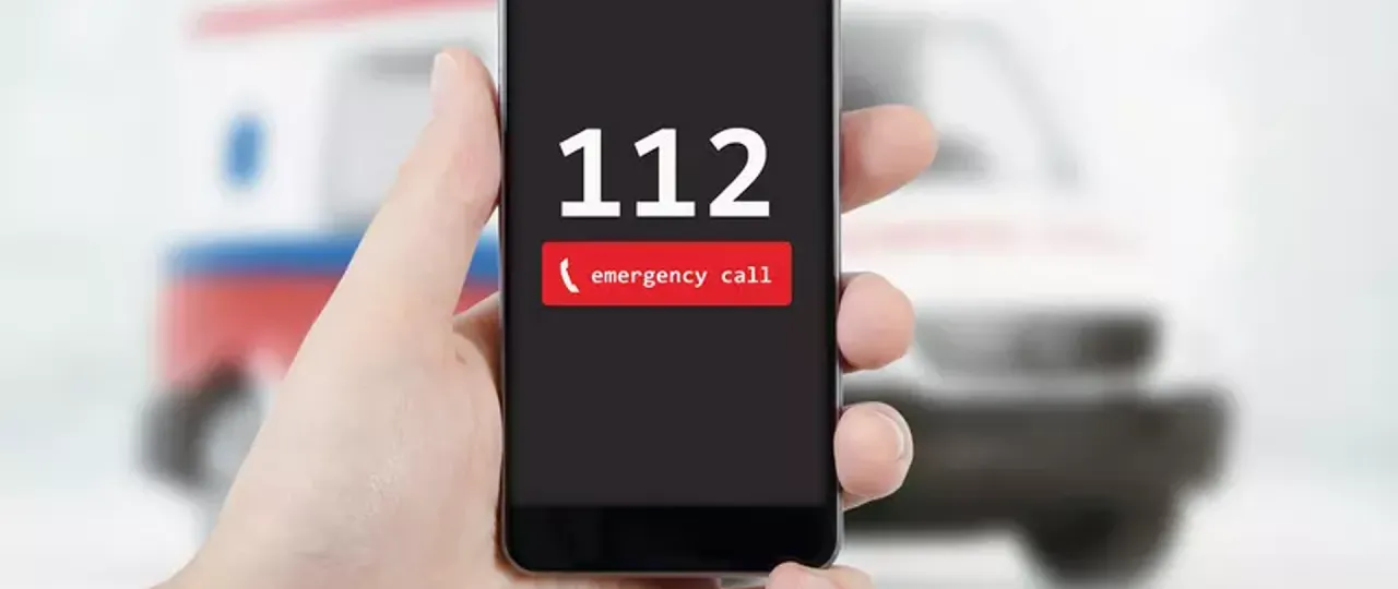 Telefon z numerem alarmowym 112 i numerem Niebieskiej Linii
