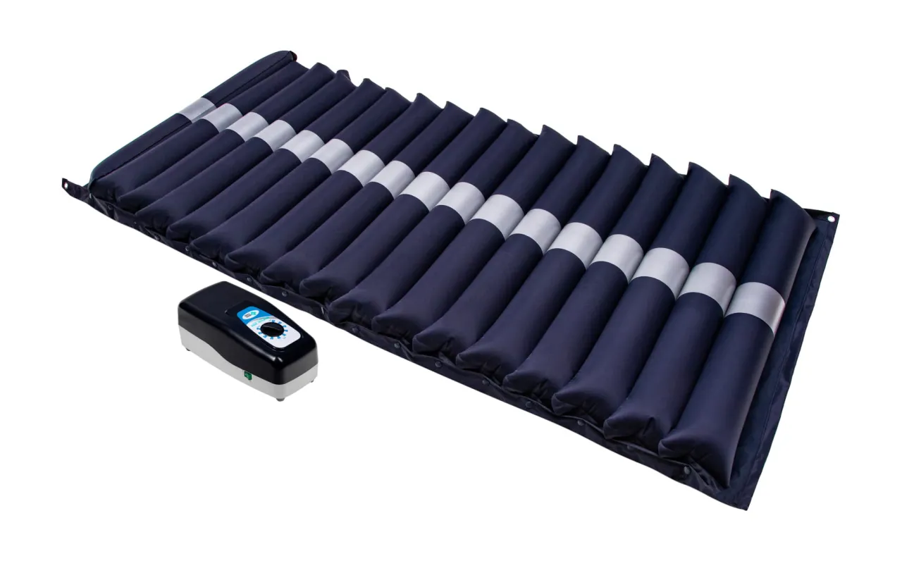 Opieka nad osobą leżącą z materacem przeciwodleżynowym