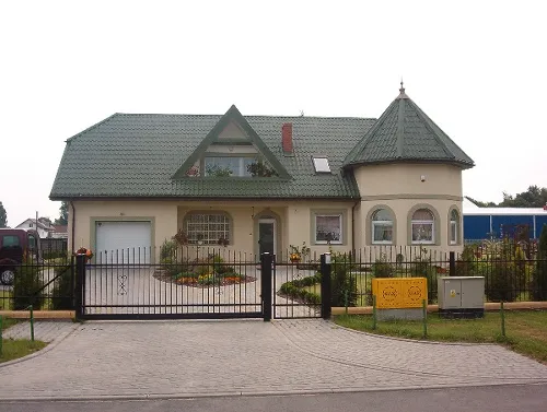 Zdjęcie Idealne kolory elewacji do zielonego dachu - inspirujące zdjęcia
