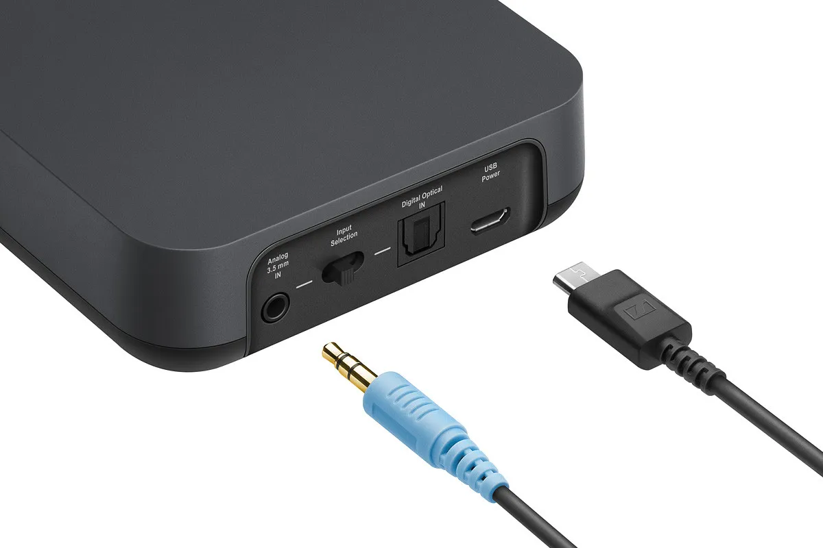 Adapter do podłączenia słuchawek do telewizora bez wyjścia słuchawkowego. Widoczny kabel jack 3.5mm i USB.