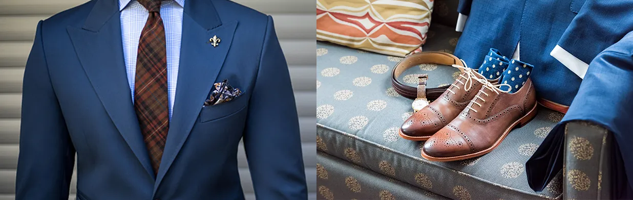 Mężczyzna w granatowym garniturze i brązowych butach