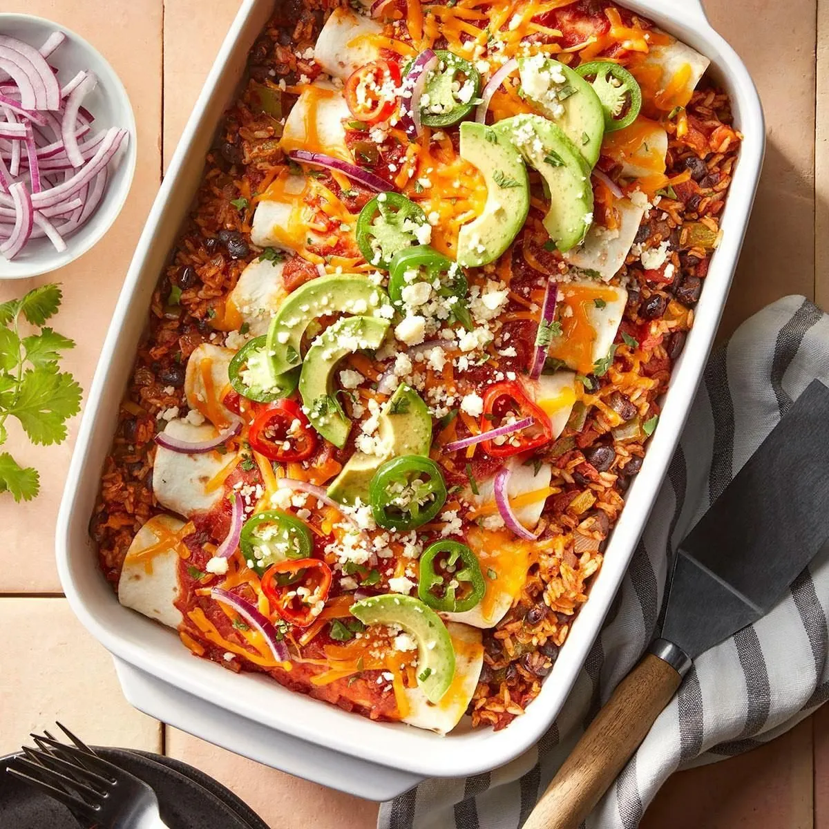 Zdjęcie Deliciosas enchiladas de arroz y frijoles que no puedes dejar de probar
