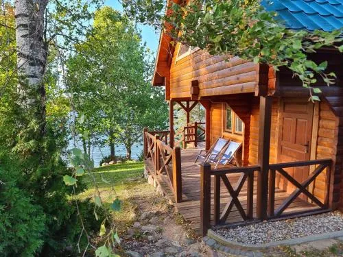 Zdjęcie Pokoje nad jeziorem w Rynie – idealne miejsce na wymarzone wakacje