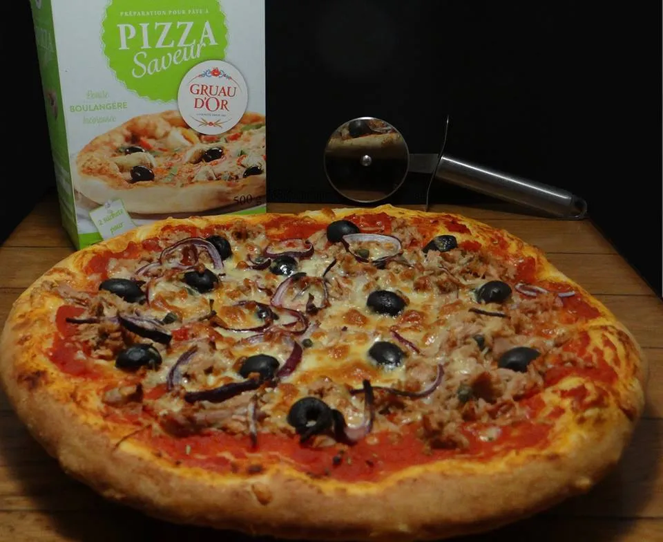 Zdjęcie Pizza thon tomate moutarde: le secret d'une recette inoubliable.