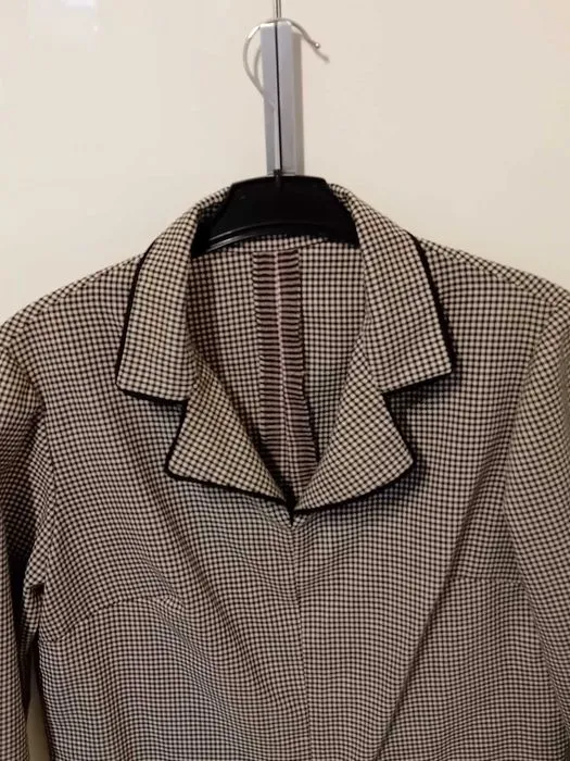 Zdjęcie Sukienki w stylu PRL: Odkryj unikalne wzory i trendy mody retro