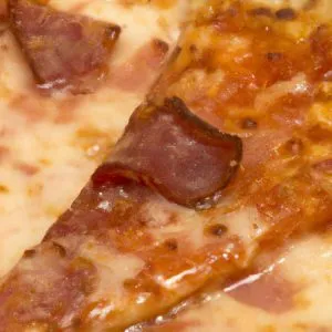 Zdjęcie Ile kawałków ma pizza 32 cm? Sprawdź, jak idealnie podzielić dużą pizzę!