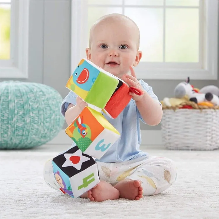 Zdjęcie Kostki sensoryczne Fisher Price: Magiczny świat zabawy i rozwoju dziecka