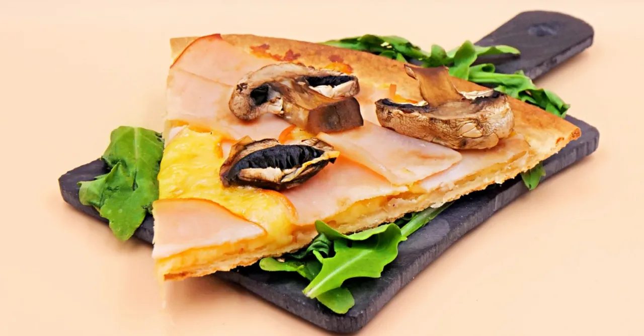 Zdjęcie Z czym jest pizza capriciosa? Odkryj jej składniki i smakowite wariacje