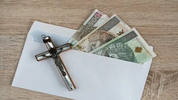 Zdjęcie Ile dać w kopertę na komunię? Odpowiednie kwoty i porady