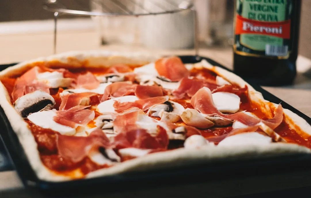 Zdjęcie Jakie składniki na pizzę? Odkryj najlepsze dodatki do pizzy