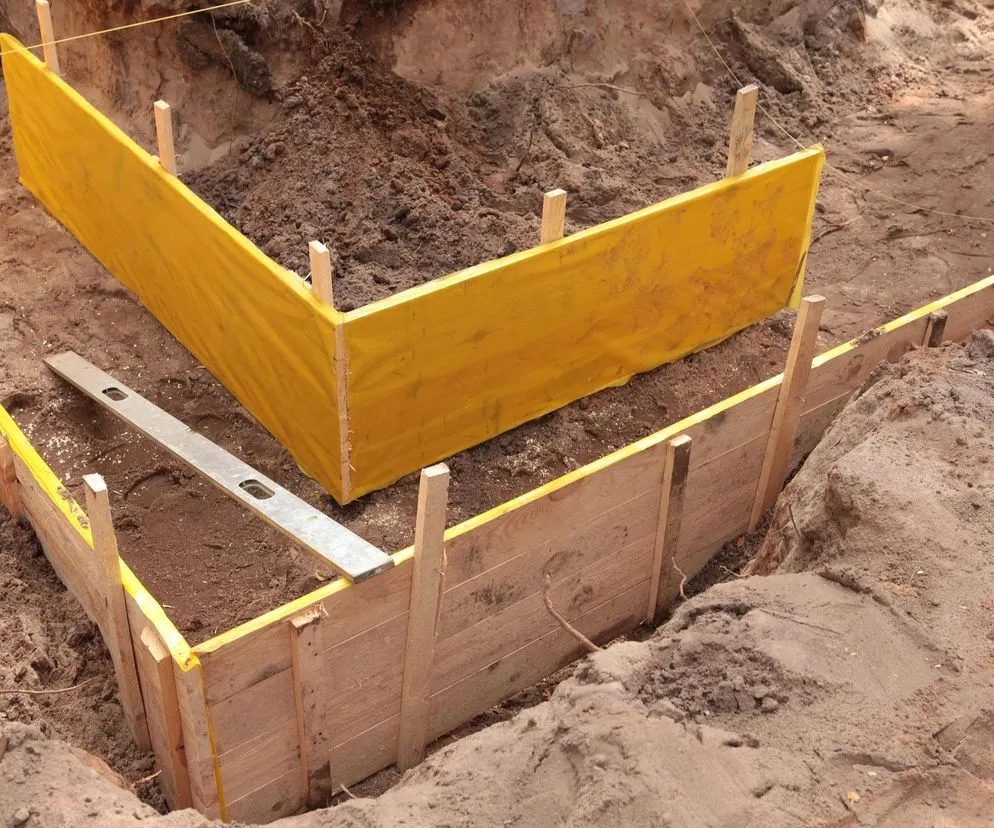 Zdjęcie Jak prawidłowo wykopać dół pod fundament - krok po kroku
