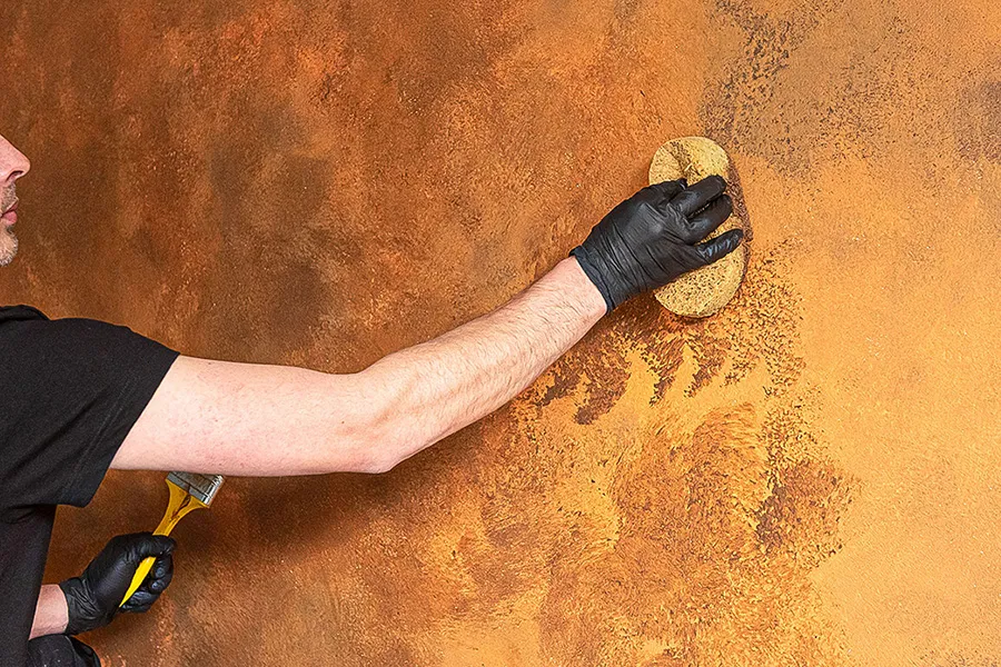 Wzory na elewacji domu - poznaj skuteczne techniki malowania dekoracyjnego