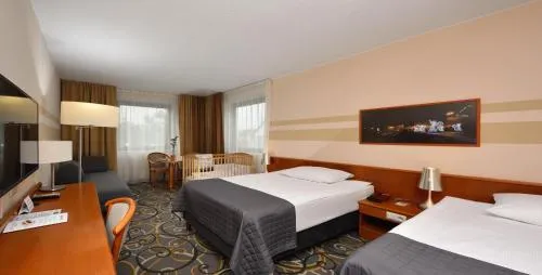 Co to jest suita w hotelu? Odkryj jej zalety i różnice z pokojem